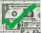 green tick on money