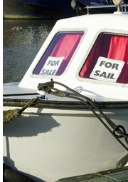 boat with for sale sign