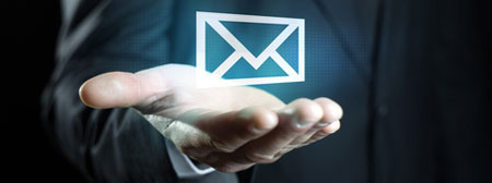 hand with electronic letter