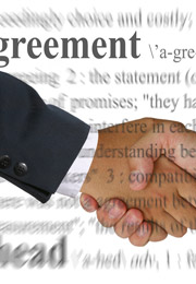 shaking hands over agreement