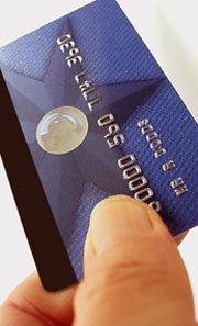 hand with credit card