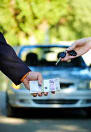 handing over money and car keys