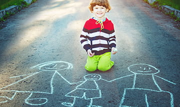 child with drawing of family