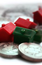 Real Estate Investments monopoly houses and money