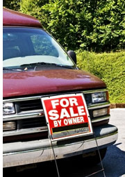 car with sign for sale by owner