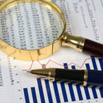 pen and magnifying glass